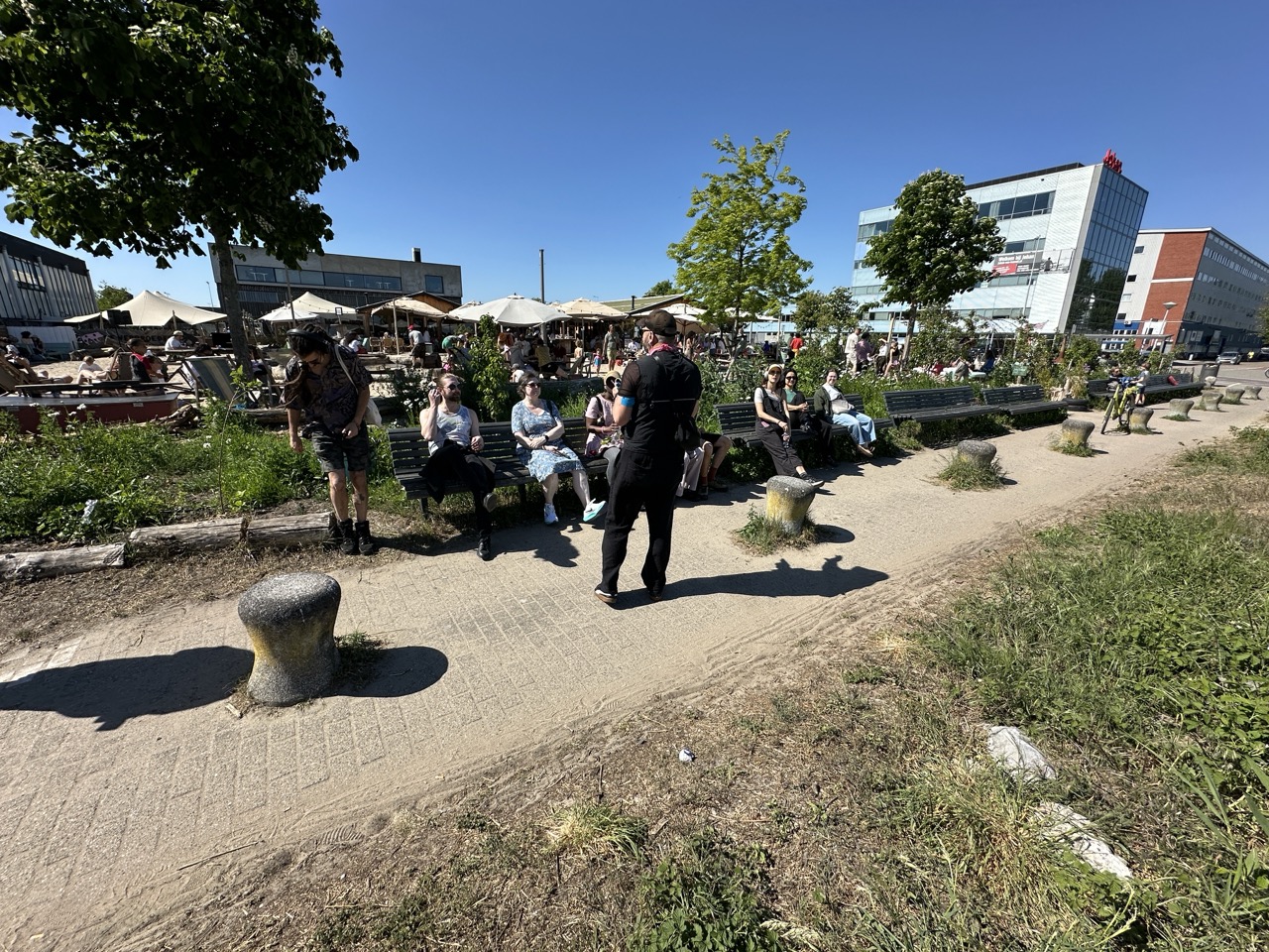 Taking a short break at our halfway point in front of De VerbroederIJ and the Zamenhofstraat ferry terminal